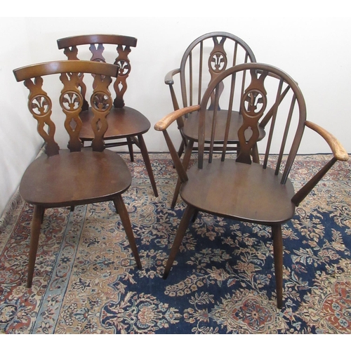 817 - Pair of Ercol elbow chairs with arched backs, circular gold labels, and a pair of Ercol dining chair... 