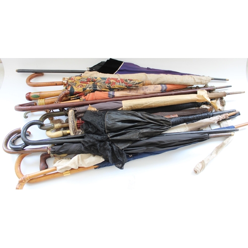 129 - Collection of late C19th to mid C20th parasols, umbrellas and canes, max H96cm