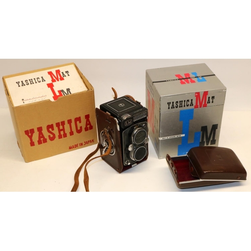 1319 - Yashica MAT LM camera with leather case and original box; Gnome photographic enlarger; and other pho... 