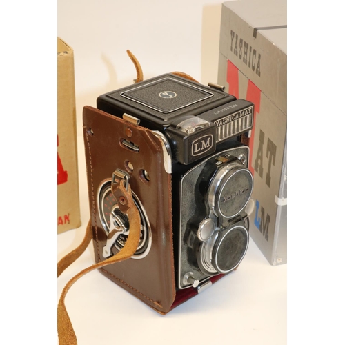 1319 - Yashica MAT LM camera with leather case and original box; Gnome photographic enlarger; and other pho... 