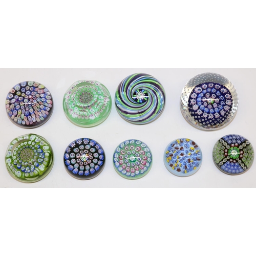 397 - Nine John Deacons glass paperweights incl. millefiori, seven with signature thistle cane, max. D7cm