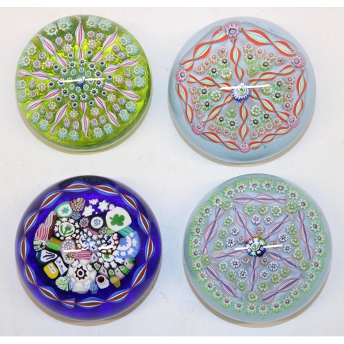 401 - Four John Deacons glass millefiori paperweights, all with signature thistle cane, max. D7cm