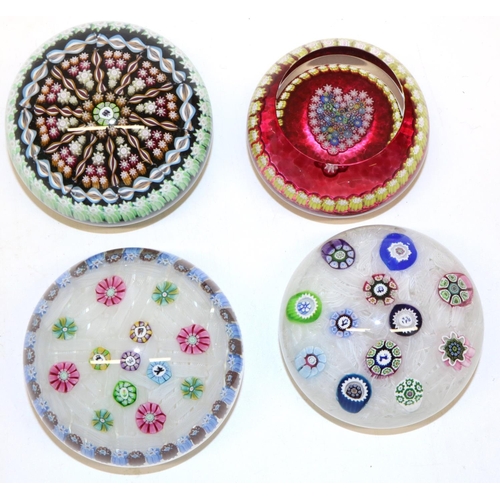 404 - Four Perthshire glass millefiori paperweights, incl. two with silhouette canes, max. D7.5cm