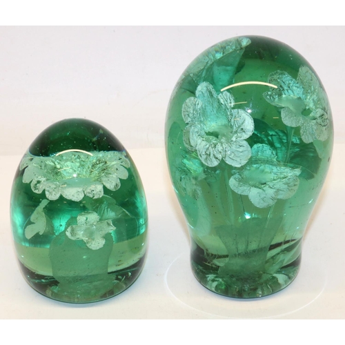 406 - Two Victorian glass dump paperweights with internal flowers, max. H13.5cm