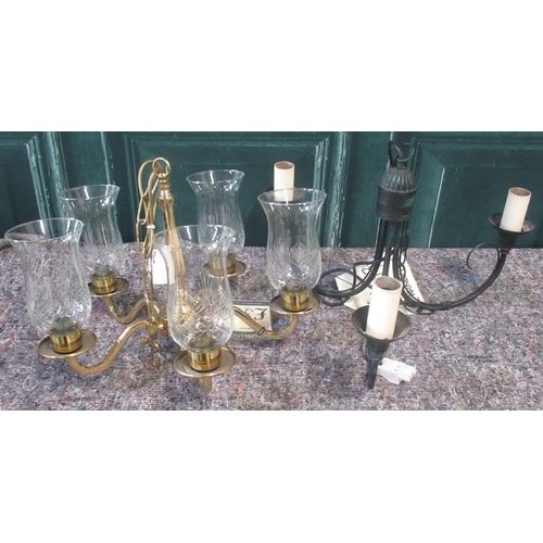 139 - Brass four branch chandelier with glass storm type shades, and a wrought metal verdigris finish thre... 