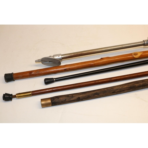 304 - Aluminium and plated shooting stick and four other walking sticks (5)