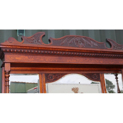 743 - Victorian oak mirror back sideboard, with arched cornice and three mirror plates above three drawers... 