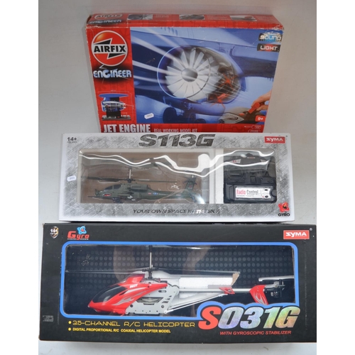 173 - Large Syma S031G radio controlled helicopter with hand held transmitter and battery charger (charger... 