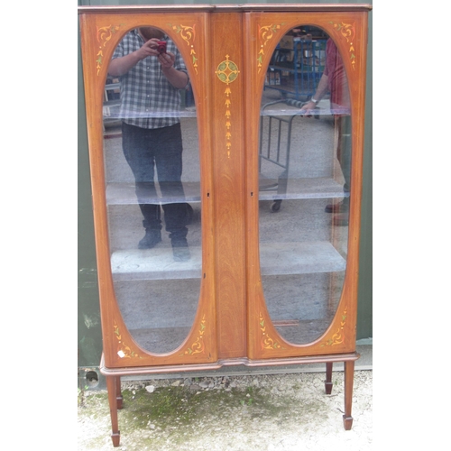 767 - Edwardian inlaid mahogany and boxwood strung display cabinet, with two oval glazed doors and three s... 