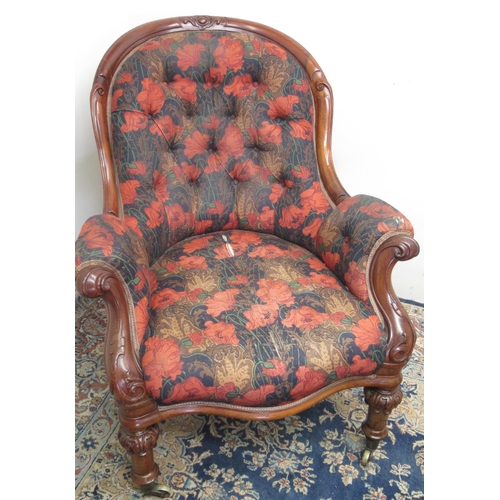 782 - Victorian carved mahogany framed arm chair, buttoned back and serpentine seat on carved legs with br... 