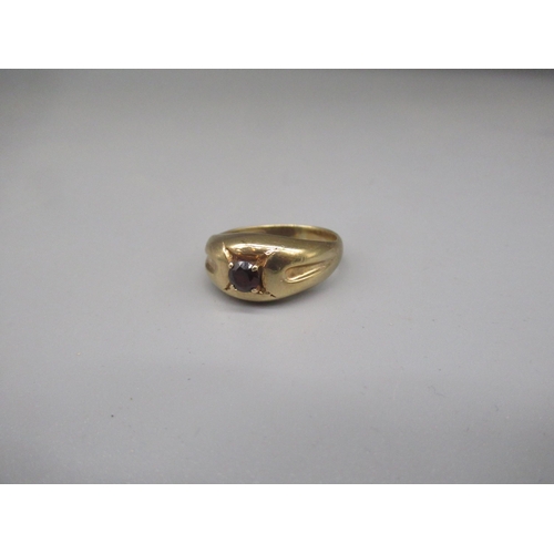 1241 - 9ct yellow gold ring set with single red stone, stamped 375, size V, 6.3g