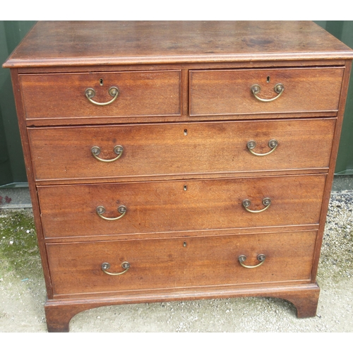 793 - George 111 oak chest of two short and three long graduated ted cockbeaded drawers, with brass handle... 