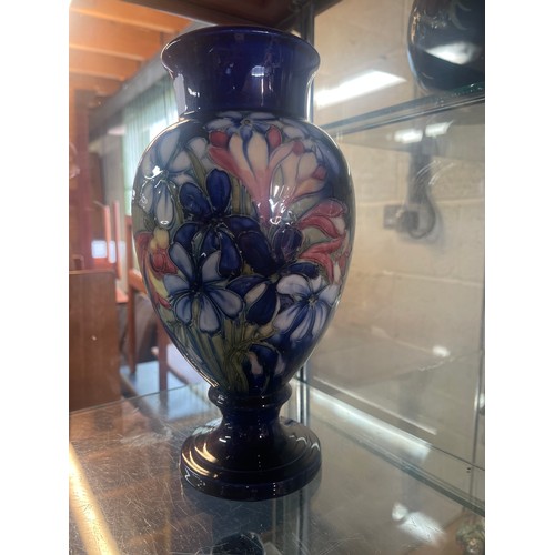 195 - Moorcroft Pottery: Spring Flowers pattern baluster urn vase, tube lined with pink, yellow and blue f... 