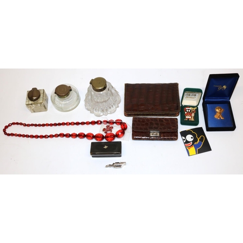 348 - Hallmarked silver whistle; two brown crocodile leather purses incl. one with silver mount; three bra... 