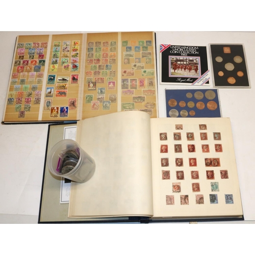 350 - Two world stamp albums, and a collection of commemorative coins