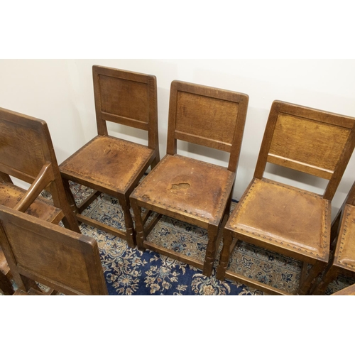 1350 - Robert Mouseman Thompson of Kilburn - a set of ten (8 + 2) oak dining chairs, with adzed panel backs... 