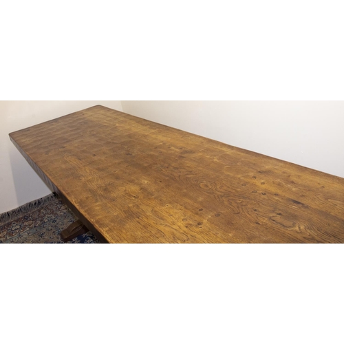 1351 - Robert Mouseman Thompson of Kilburn - a large oak refectory style dining table, the adzed pegged rec... 