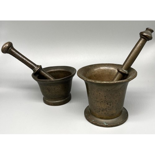 267 - Two C19th style patinated brass apothecary mortars and pestles