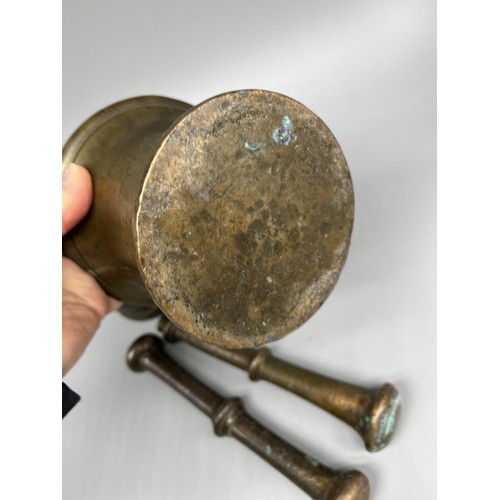 267 - Two C19th style patinated brass apothecary mortars and pestles