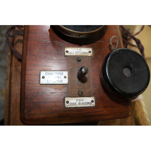 291 - Early C20th pair of wall mounted Ericsson oak cased signal box telephones, complete with original in... 