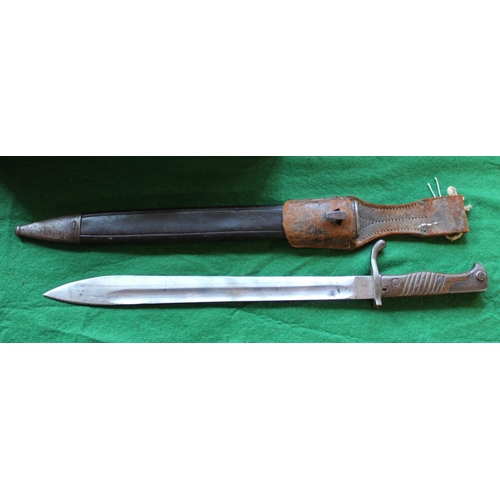 700 - Vintage World War I era Mauser bayonet with original sheath and frog. Blade length  37.1cm.