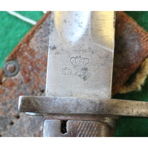 700 - Vintage World War I era Mauser bayonet with original sheath and frog. Blade length  37.1cm.