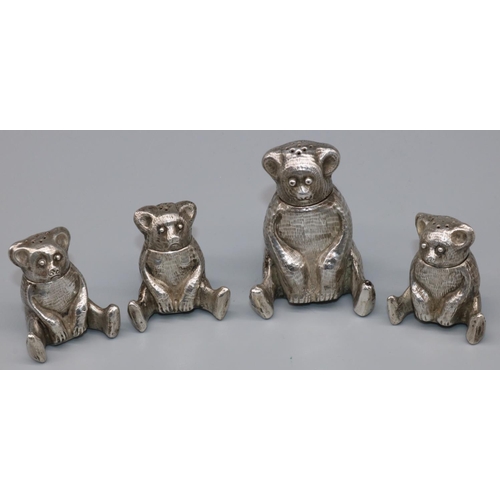 1067 - Group of four C20th continental white metal novelty seated teddy bear pepperettes, H6cm max (4)