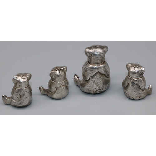 1067 - Group of four C20th continental white metal novelty seated teddy bear pepperettes, H6cm max (4)