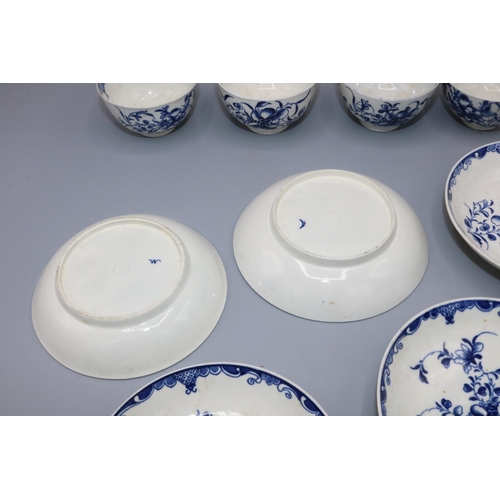 1142 - Four early Worcester Mansfield pattern blue and white tea bowls and five saucers, with Crescent or s... 