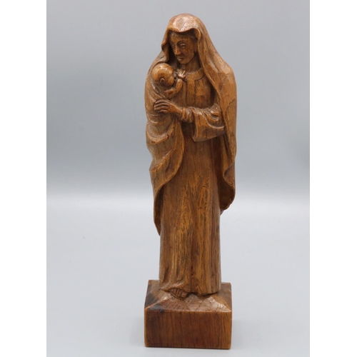 1379 - Martin Lizardman Dutton of Huby - an oak carved model of The Madonna and Child, on rectangular base ... 