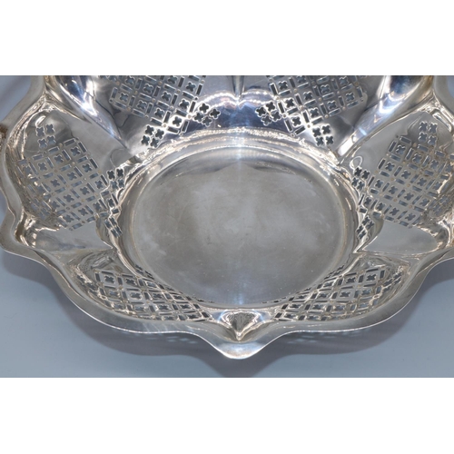 1059 - George V hallmarked silver circular cake basket, with geometrically pierced tapering sides and shape... 