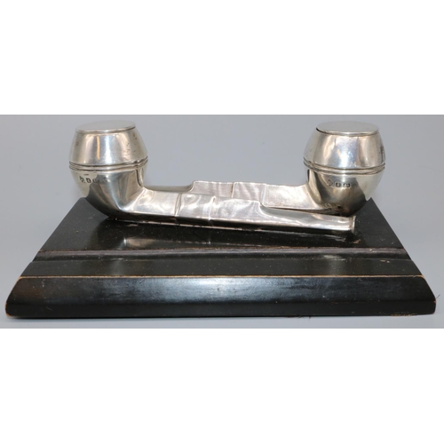 1056 - George V rectangular inkstand with two hallmarked silver pipe ink wells, on ebonised wooden base, ma... 