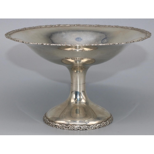 1087 - George V hallmarked silver pedestal bon bon dish, with scroll cast borders on tapering circular base... 