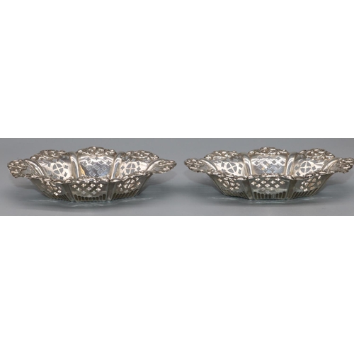 1088 - Pair of Victorian hallmarked silver oval pierced bon bon dishes with scroll borders, by Miller Broth... 