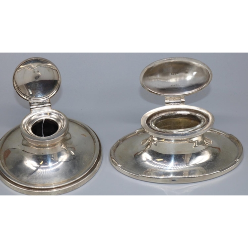 1079 - George V hallmarked silver Art Deco oval capstan inkwell, with hinged cover on stepped base, maker u... 