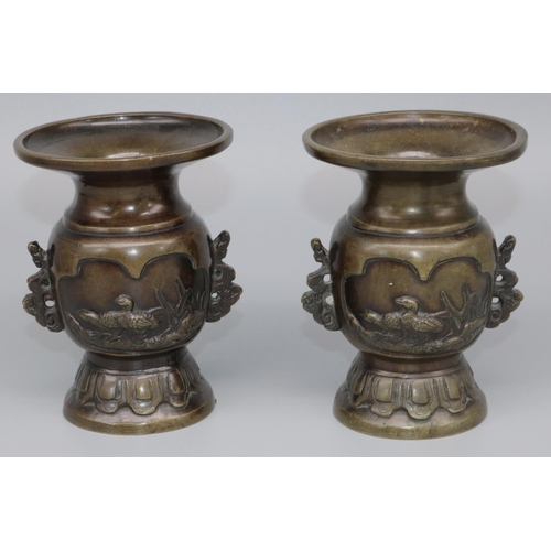 1115 - Pair of Japanese Meiji bronze two handled vases, bodies relief decorated with birds, H12cm (2)