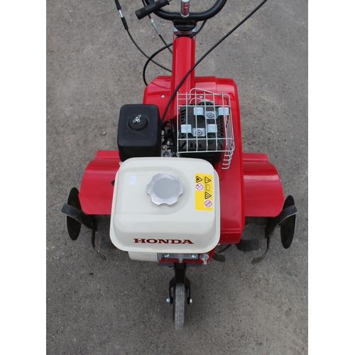 1390 - Honda FG320 petrol rotavator with 6 wheel blades, little used and in very good order, complete with ... 