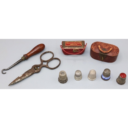 1121 - Of Sewing Interest - Red leather sarcophagus shaped needlepacket box, the lid tooled in gilt 'Willia... 