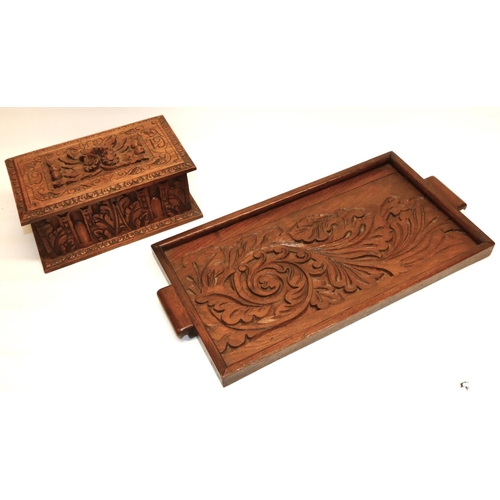 1109 - Early C20th oak box, with arcade and oak leaf carved sides, hinged lid with relief carved floral han... 