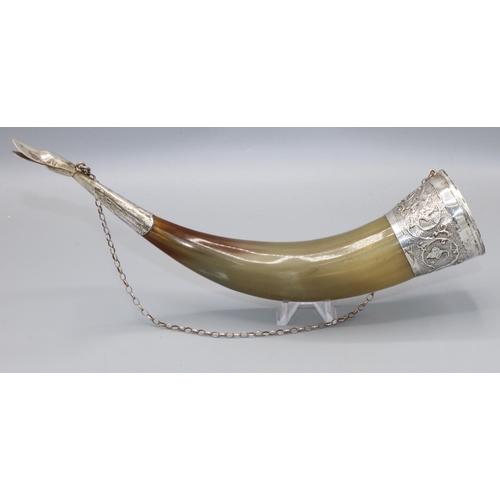 1068 - Russian hallmarked silver mounted cow horn, repousse with leaf and scrolls on a matted ground, L28cm