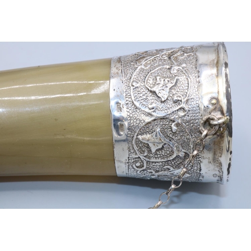 1068 - Russian hallmarked silver mounted cow horn, repousse with leaf and scrolls on a matted ground, L28cm