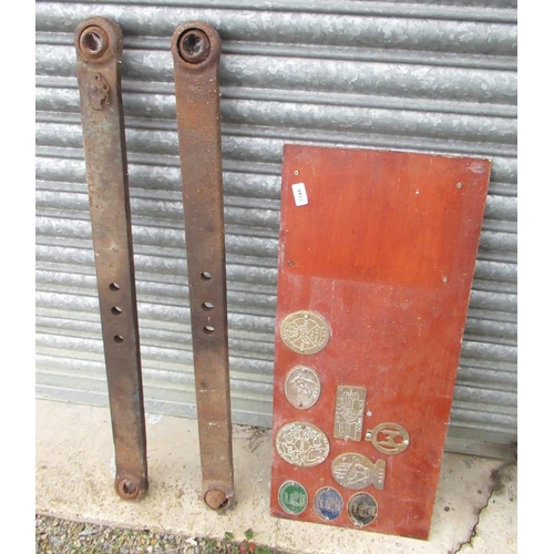 1399 - Wood board with metal and brass commemorative Traction Rally Plaques and two Massey Ferguson style t... 