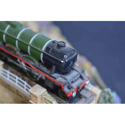 41 - Lilliput Lane Flying Scotsman model (L2661) in very good condition, 2 chips to the higher Railway Ta... 