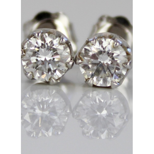1006 - 18ct white gold diamond stud earrings, each set with single round cut diamond, stamped 750, 1.5g, th... 