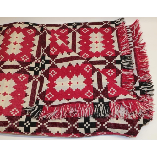 1291 - Vintage Welsh woolen blanket in red, black, white and grey geometric pattern, with attached label 'J... 