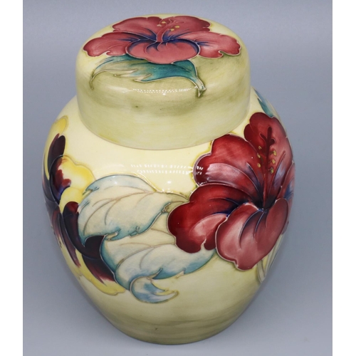 1151 - Moorcroft Pottery: Hibiscus pattern ginger jar and cover, tubelined decoration of yellow and burgund... 