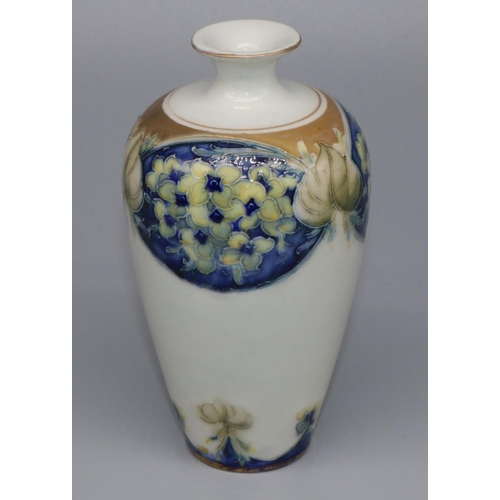 1139 - William Moorcroft for James Macintyre & Co: Florian ware vase of high shouldered form, Pansy pattern... 