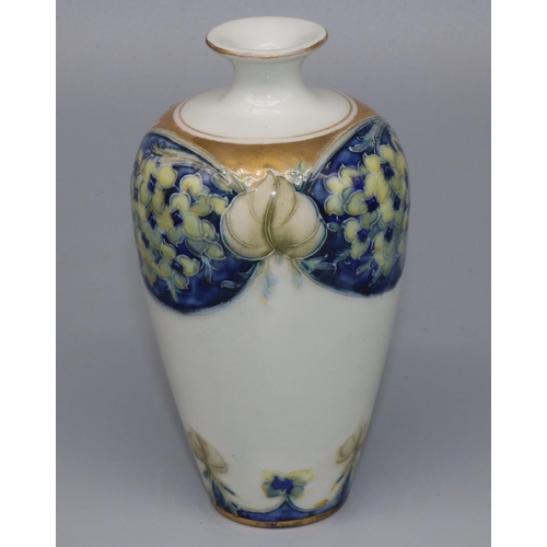 1139 - William Moorcroft for James Macintyre & Co: Florian ware vase of high shouldered form, Pansy pattern... 