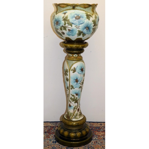 1135 - Burmantofts Faience jardiniere on pedestal, relief decorated with blue Peony flowers and green leafa... 