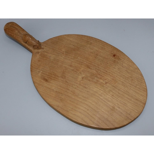 1368 - Robert Mouseman Thompson of Kilburn - an adzed oak oval cheese board, curved handle carved with sign... 